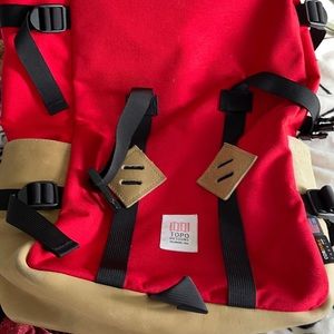 Topo designs Colorado red and yellow backpack